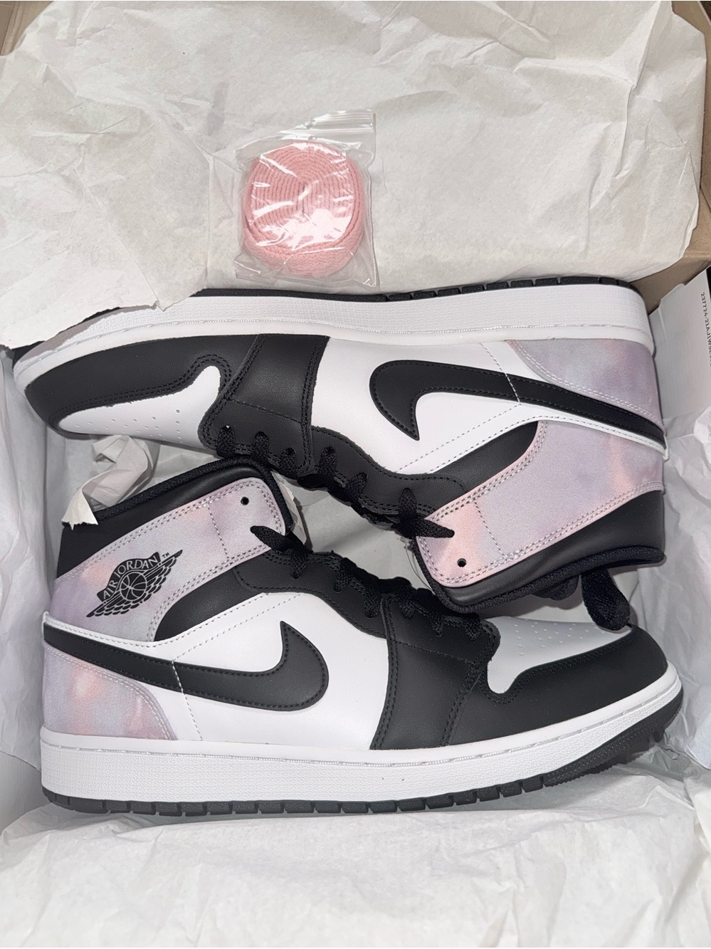 Jordan• 1 Mid SE in Black, Bleached Coral, White